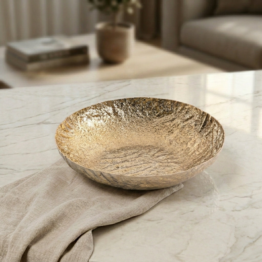 Golden round metal bowl