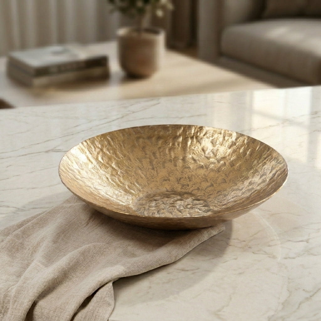 Golden round metal bowl