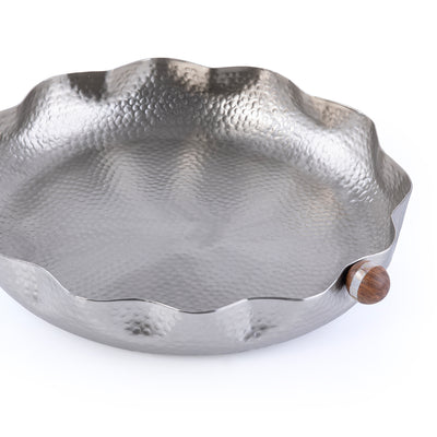 Large Circular Metal Plate With A Wooden Handle