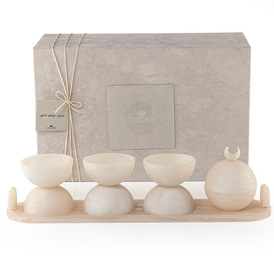 Set of 4 beige serving bowls set on tray with gift box