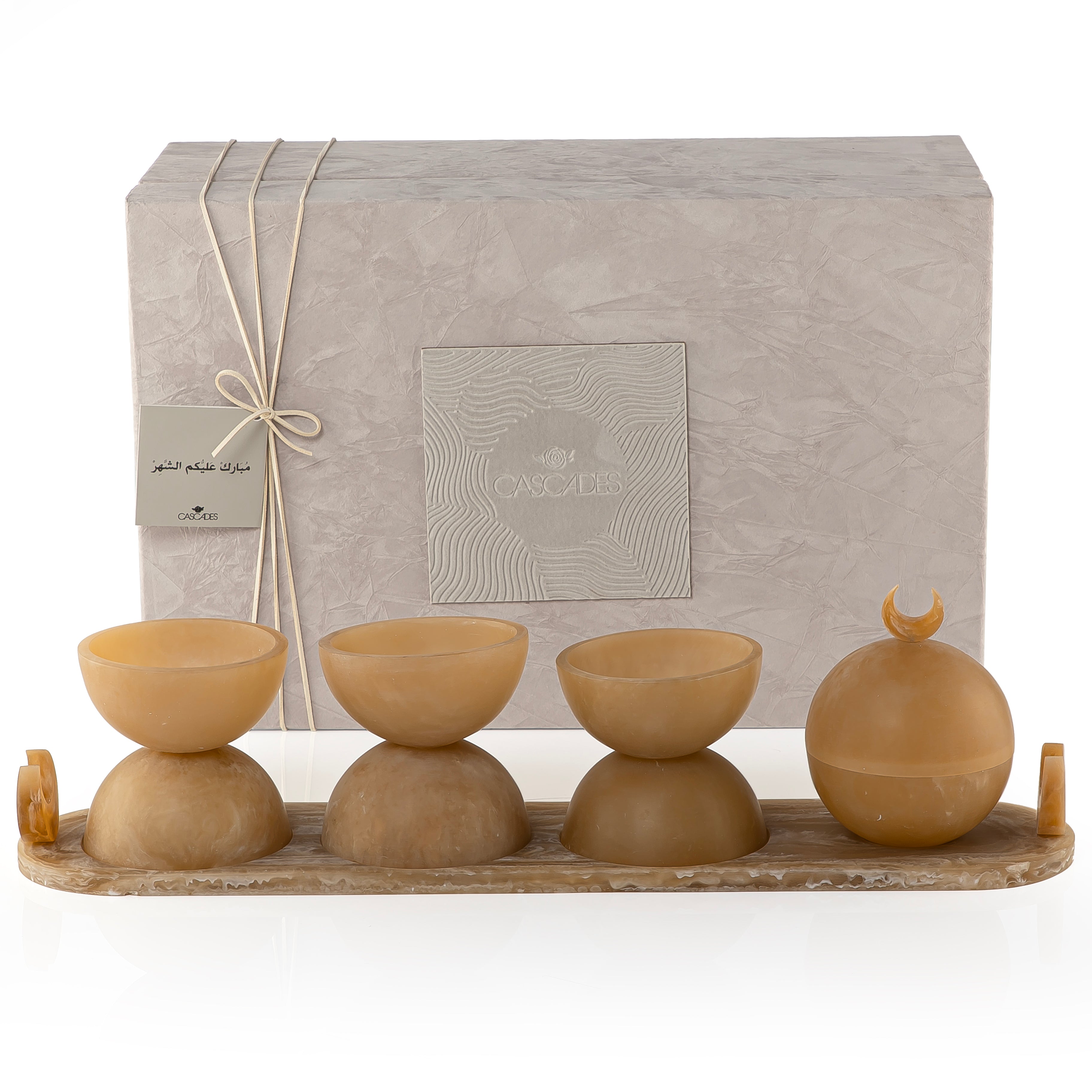Set of 4 yellow serving bowls set on tray with gift box