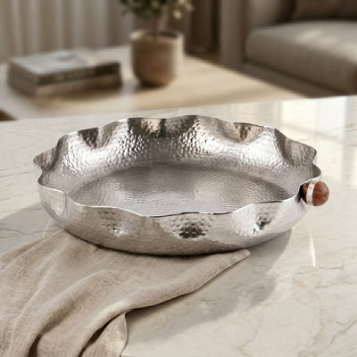 Large Circular Metal Plate With A Wooden Handle