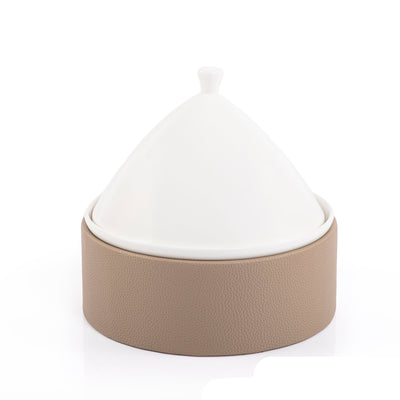 Ceramic plate with leather base