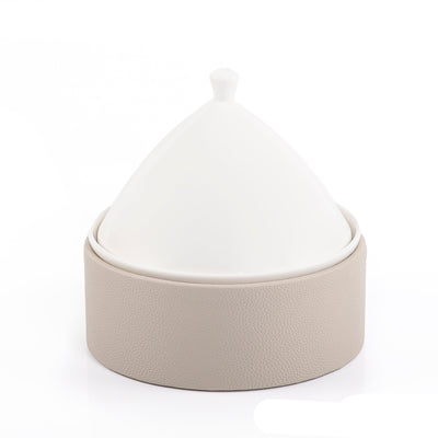 Ceramic plate with leather base
