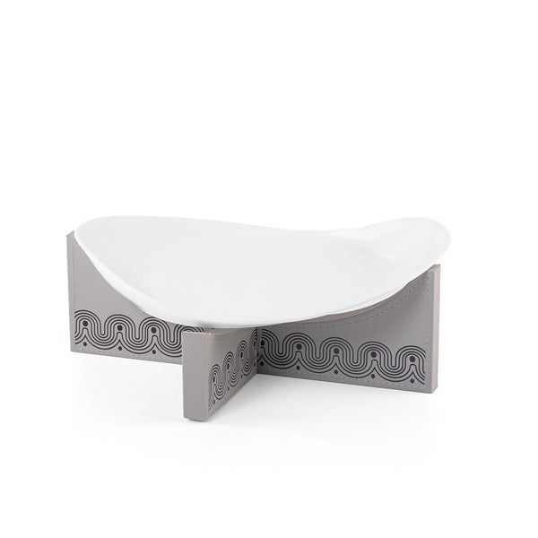 Dark grey leather stand with round ceramic plate