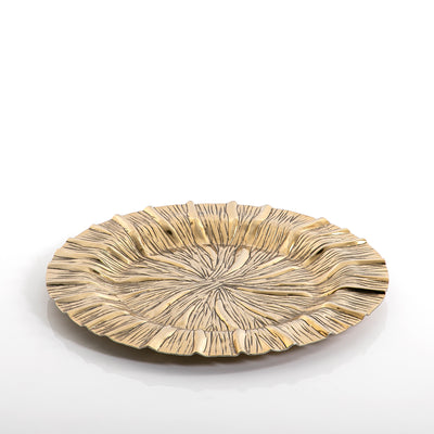 Golden circular metal plate